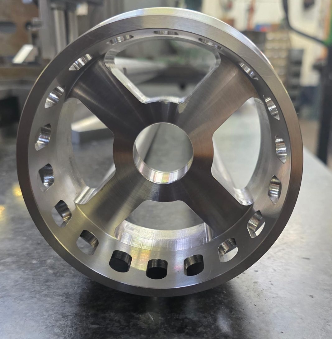 CNC milling service Manchester — precision milled wheel component, CNC machining company, Elmax Engineering